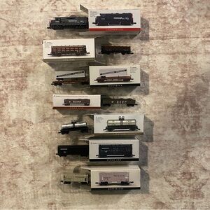 Model Train Set with Locomotive and Cars